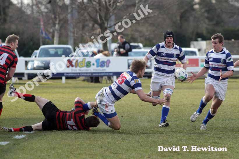 Tynedale's Chris Harris layes the ball off the Jack Harrison  against Blackheath, National League Division 1, Tynedale Park, Corbridge, Northumberland.